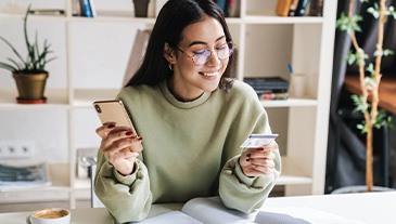 Woman using a credit card