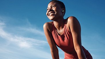 Lady smiles after exercising?